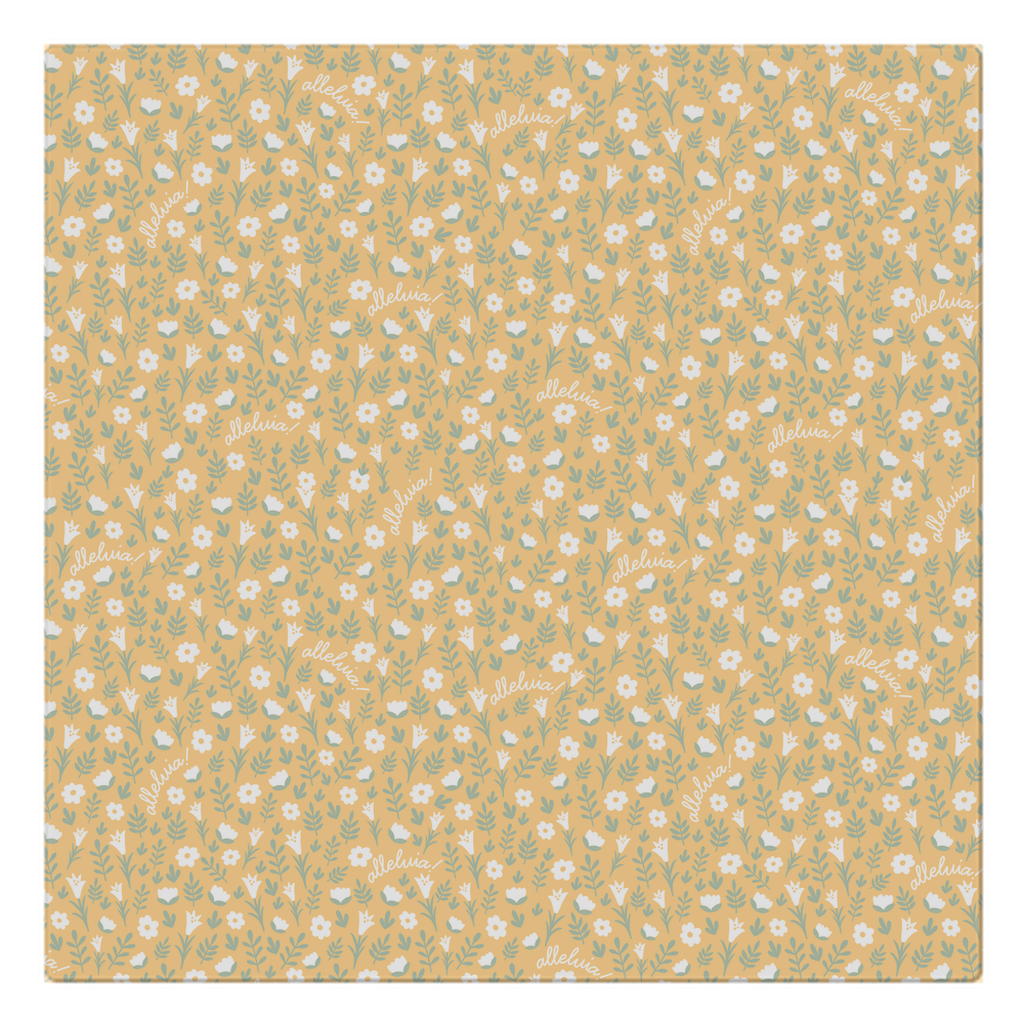 yellow colored alleluia napkin laid flat on a white background