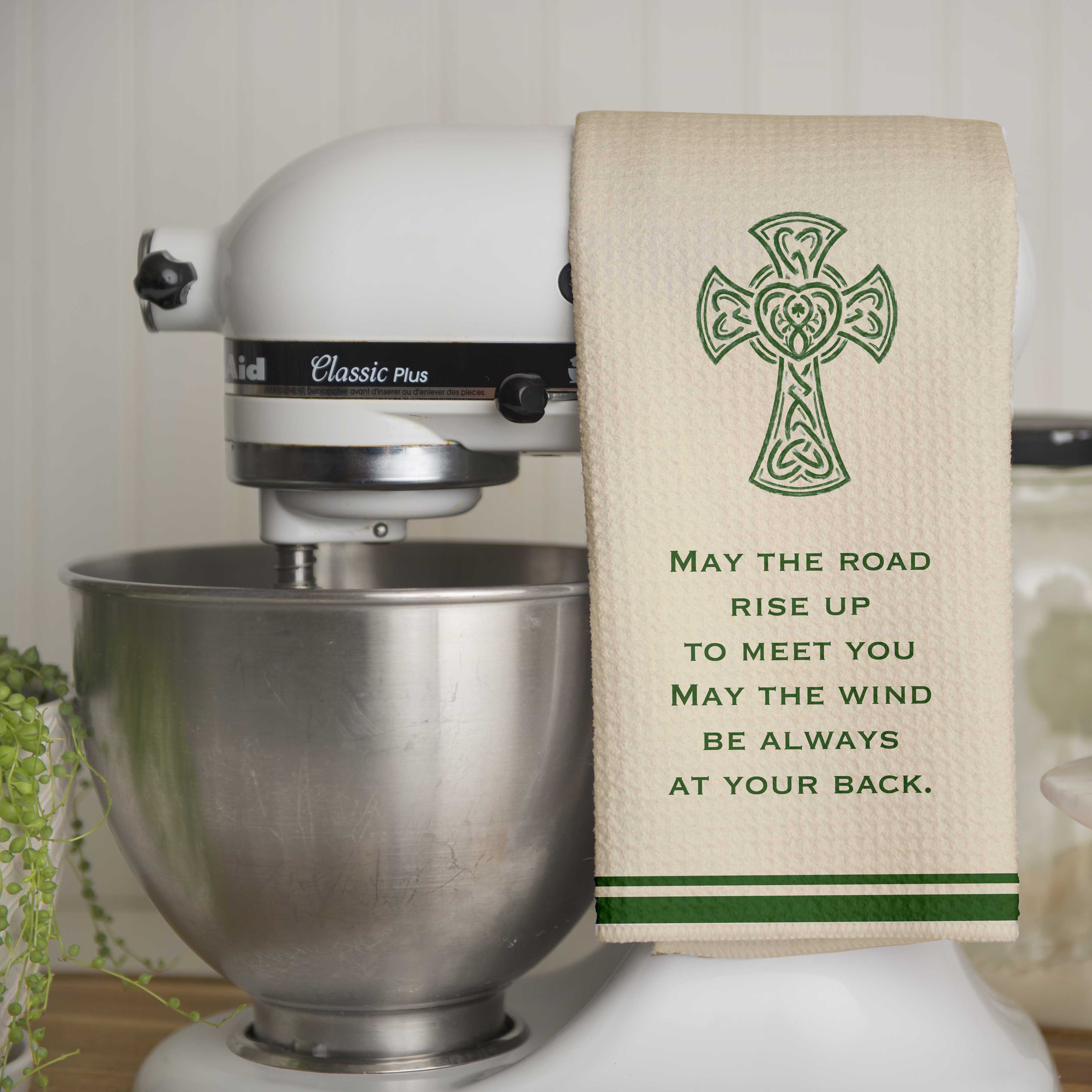 Irish Blessing Dish Towel with High Cross and words "May the road rise up to meet you may the wind be always at your back" - hanging over a standing mixer