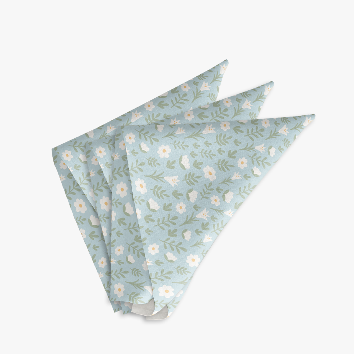 Three light blue Easter Alleluia napkins with white floral design, neatly folded on a white background.