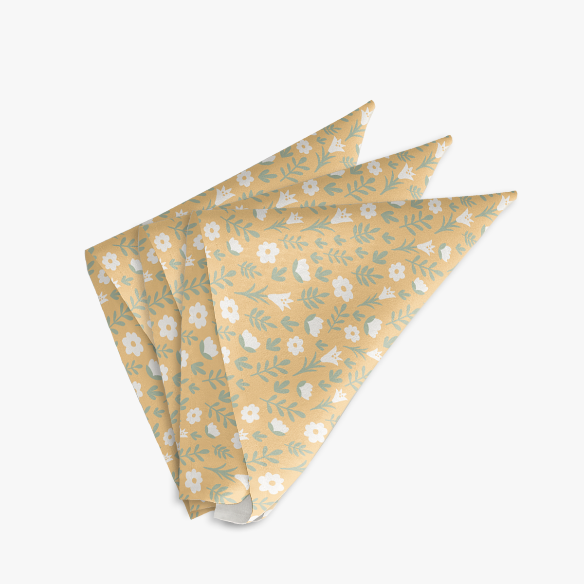 Three yellow Easter Alleluia napkins with white floral design, neatly folded on a white background.
